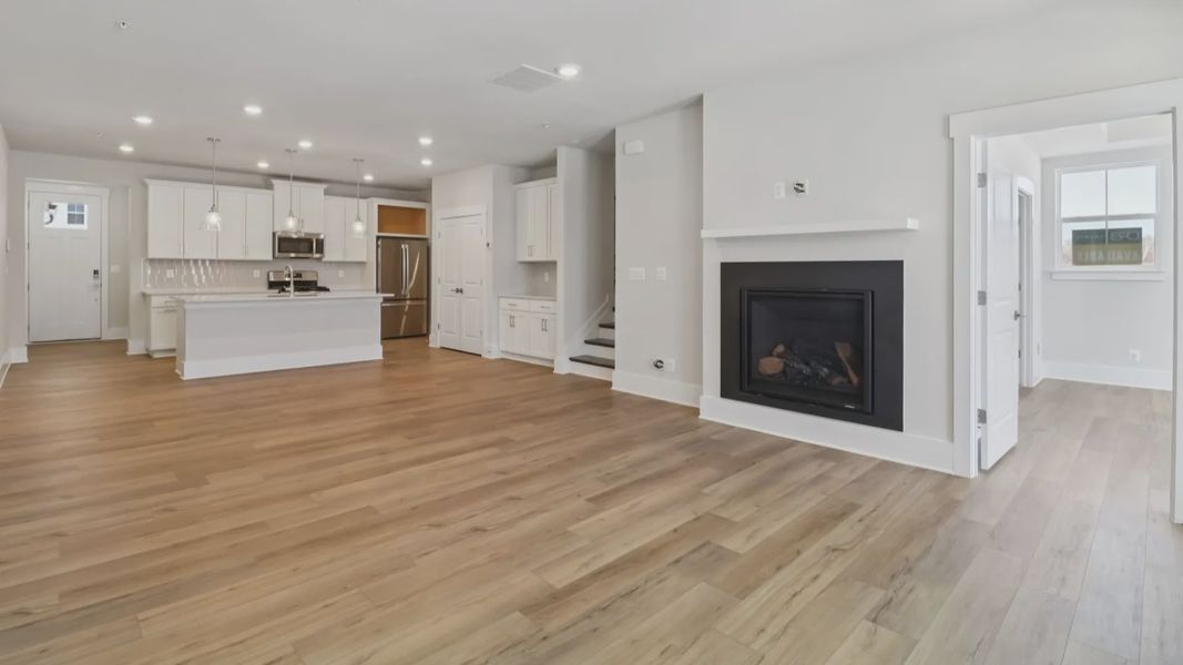 The Awaken Plan by DRB Elevate in Brook Run, Fort Mill SC - Living Space & Kitchen
