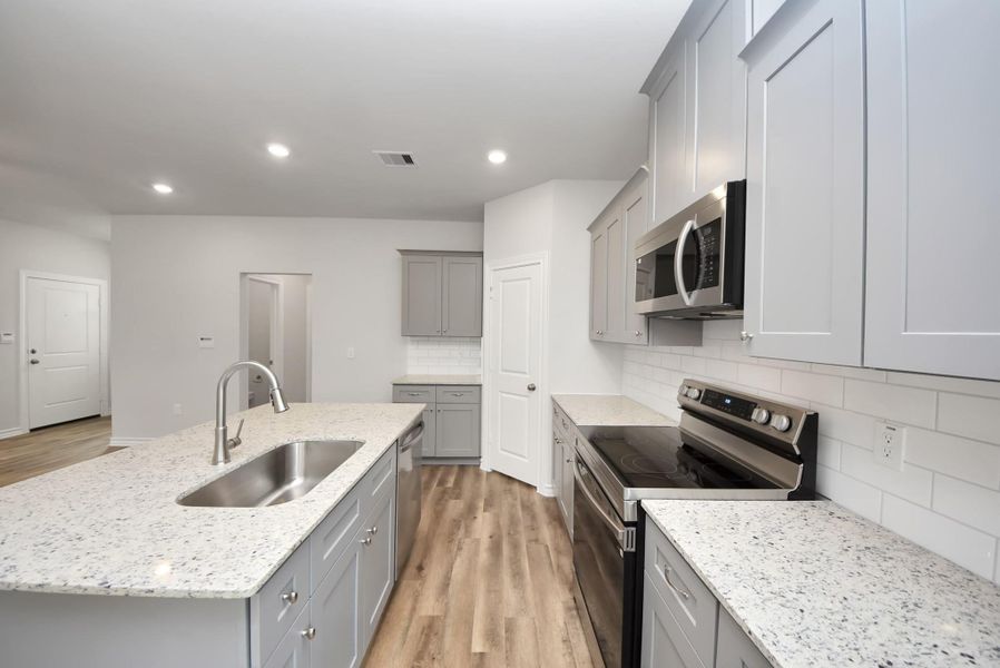 Furnished interior view inside a new home in The Enclave at Spring Branch, Conroe (Image 7).