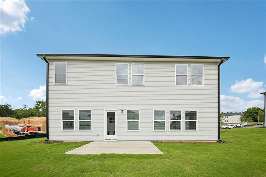 Exterior details and patio area of a home in Northwoods at Mirror Lake, Villa Rica (Image 27).