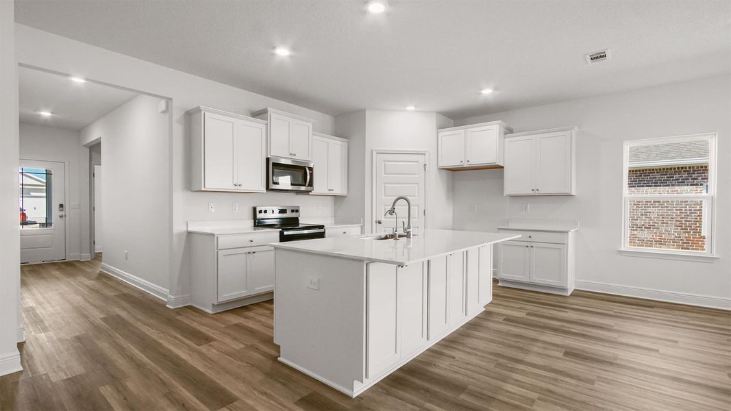 Furnished interior view inside a new home in Ashton Park Phase III, Freeport (Image 4).