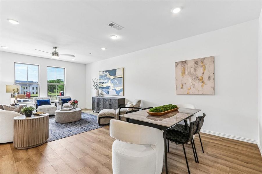With the dining room open to the kitchen and living areas, entertaining is a breeze in this wonderful home! With the dining room open to the kitchen and living areas, entertaining is a breeze in this wonderful home!