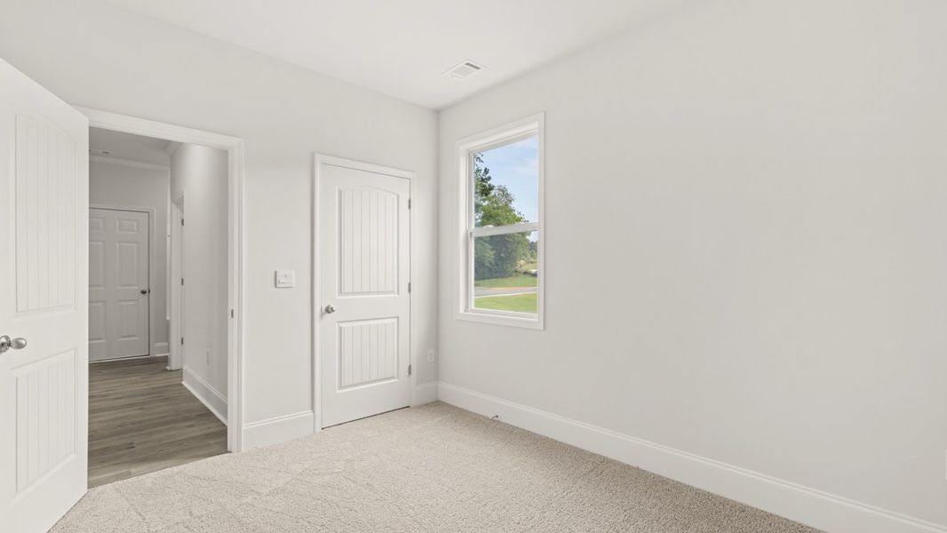 Representative unfurnished interior of a home built from the Bellview by D.R. Horton in Haven Abbey, Cumming (Image 19).