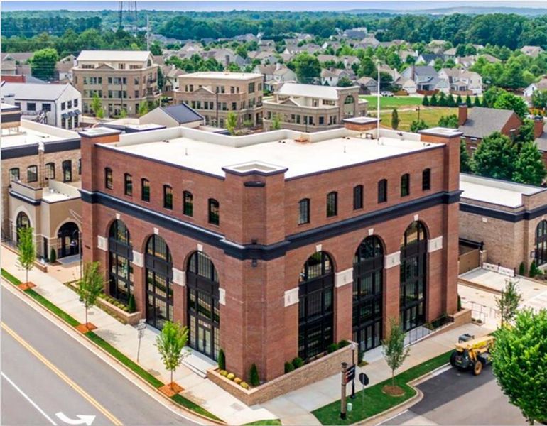 Front exterior of a new home in , Canton, GA, highlighting curb appeal (Image 1).