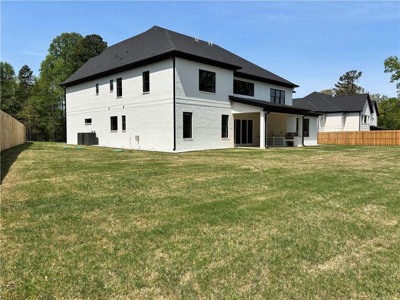 Exterior details and patio area of a home in , Buford (Image 36).