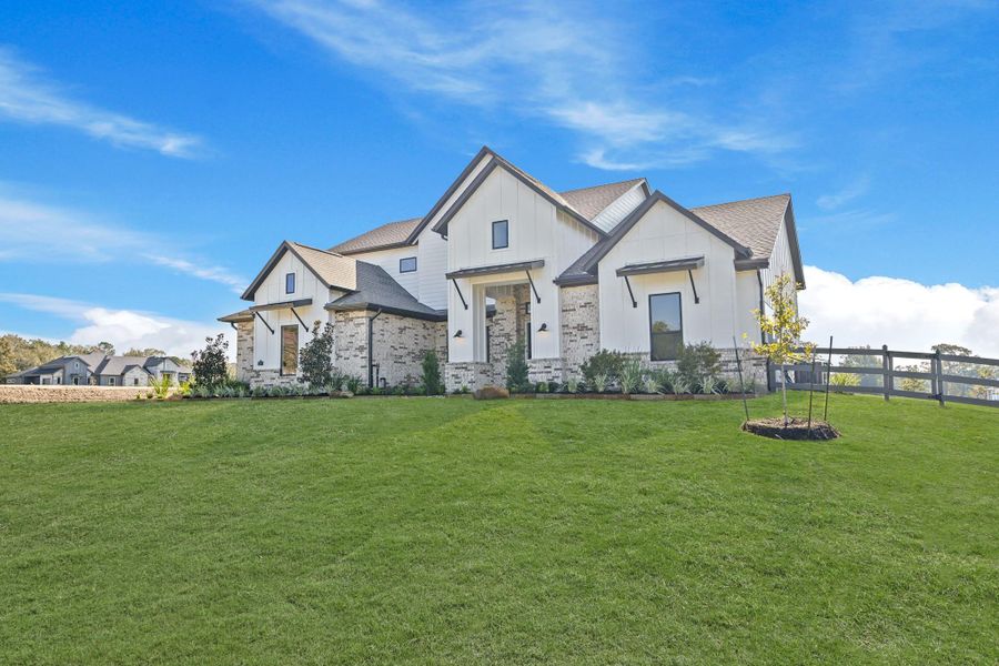 Front exterior of a new home in Bentwood Farms, Montgomery, TX, highlighting curb appeal (Image 34).