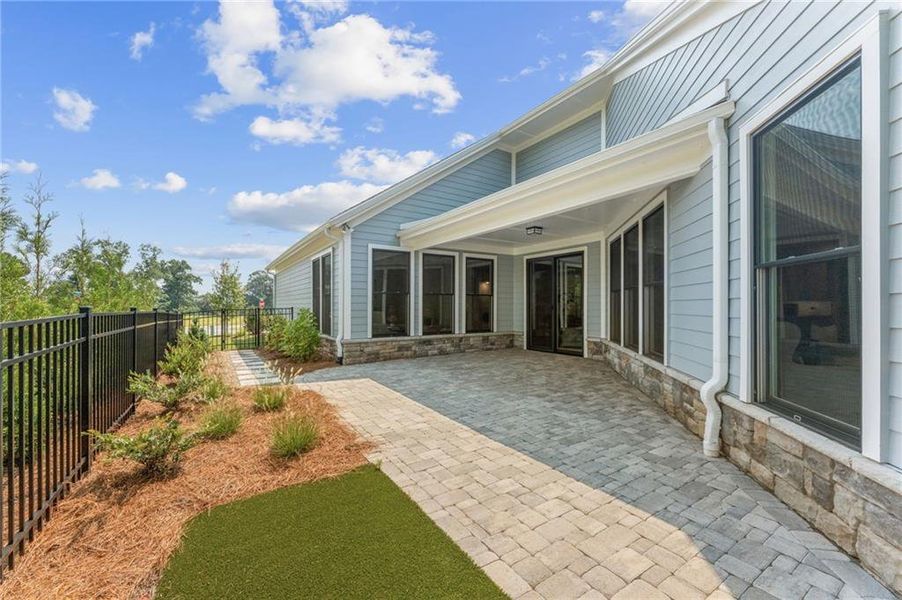 Exterior details and patio area of a home in The Courtyards at Post Road, Cumming (Image 4).