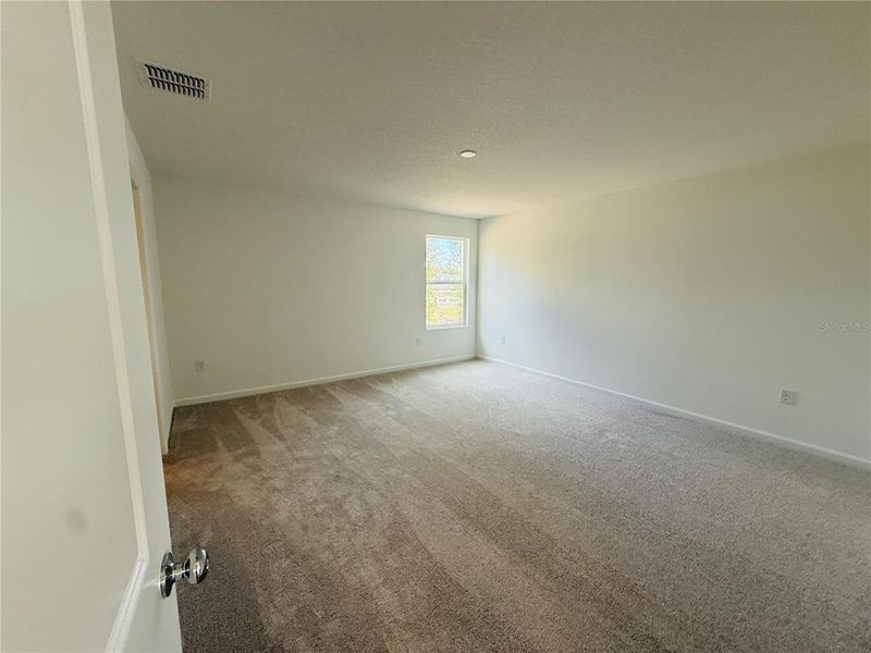 Spacious, unfurnished interior of a new home in Oak Hammock: Executive Key Collection, Deland (Image 13).