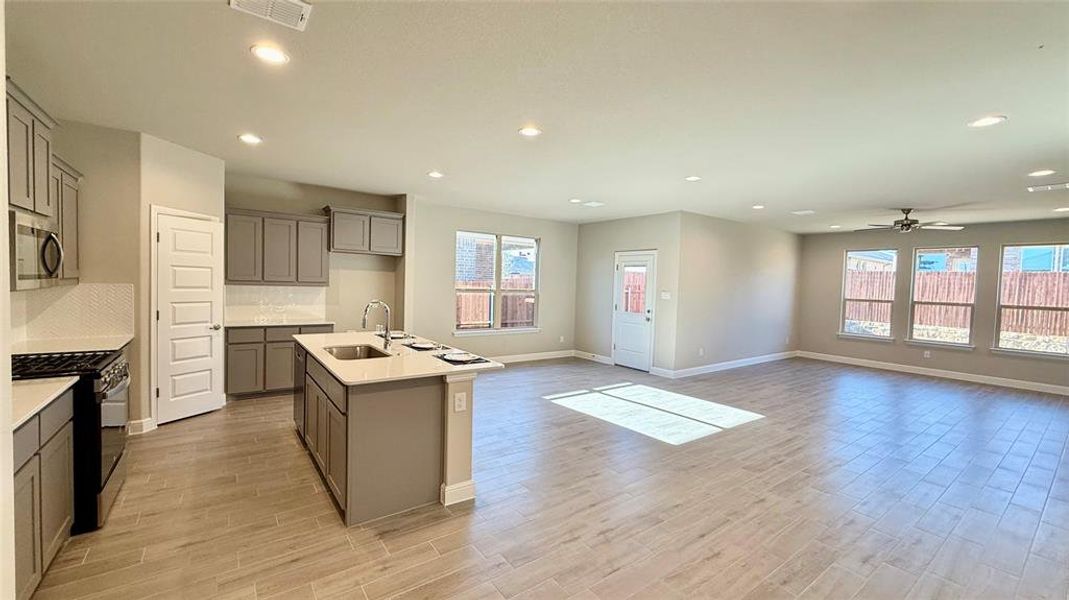 Kitchen - All Home and community information, including pricing, included features, terms, availability and amenities, are subject to change at any time without notice or obligation. All Drawings, pictures, photographs, video, square footages, floor plans, elevations, features, colors and sizes are approximate for illustration purposes only and will vary from the homes as built.