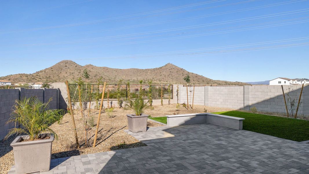 Exterior details and patio area of a home in The Ridge at Stone Butte, Phoenix (Image 24).