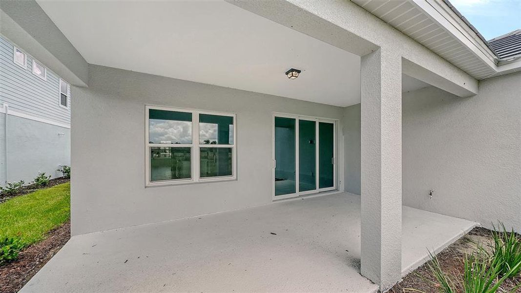 Exterior details and patio area of a home in Grand Park, Sarasota (Image 22). Exterior details and patio area of a home in Grand Park, Sarasota (Image 22).