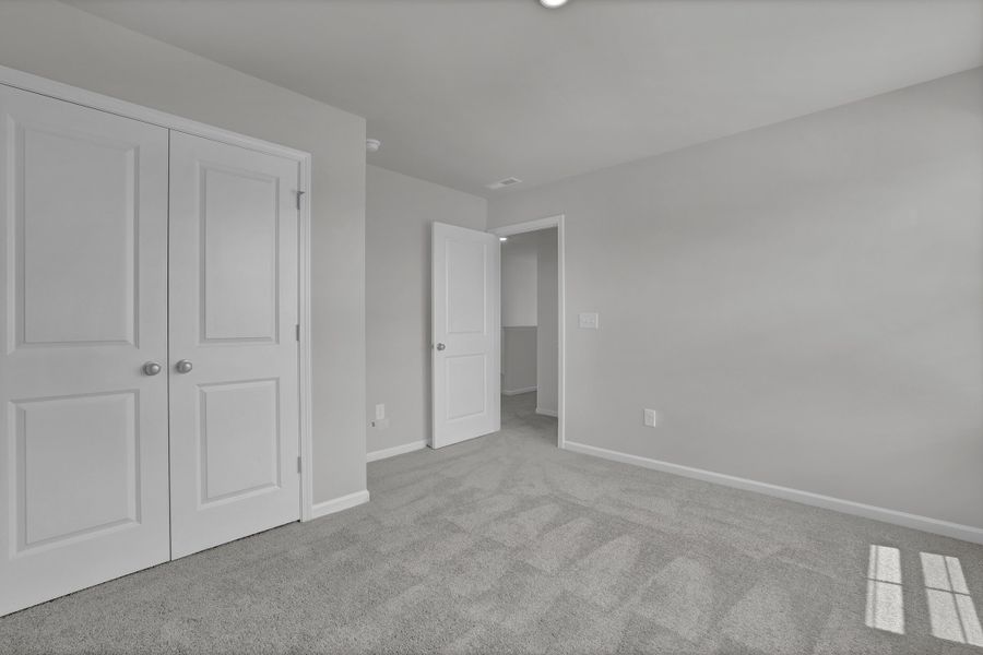 Spacious, unfurnished interior of a new home in River Tide Farms, Bolivia (Image 24).