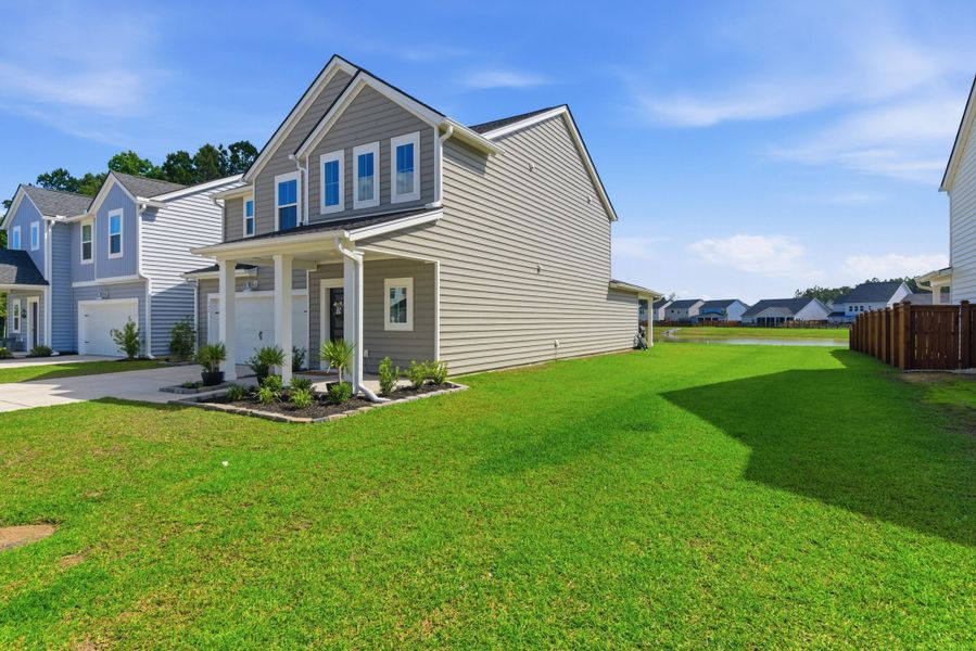 Front exterior of a new home in , Summerville, SC, highlighting curb appeal (Image 2). Front exterior of a new home in , Summerville, SC, highlighting curb appeal (Image 2).