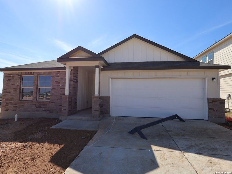 Front exterior of a new home in Paloma Park, Converse, TX, highlighting curb appeal (Image 21). Front exterior of a new home in Paloma Park, Converse, TX, highlighting curb appeal (Image 21).