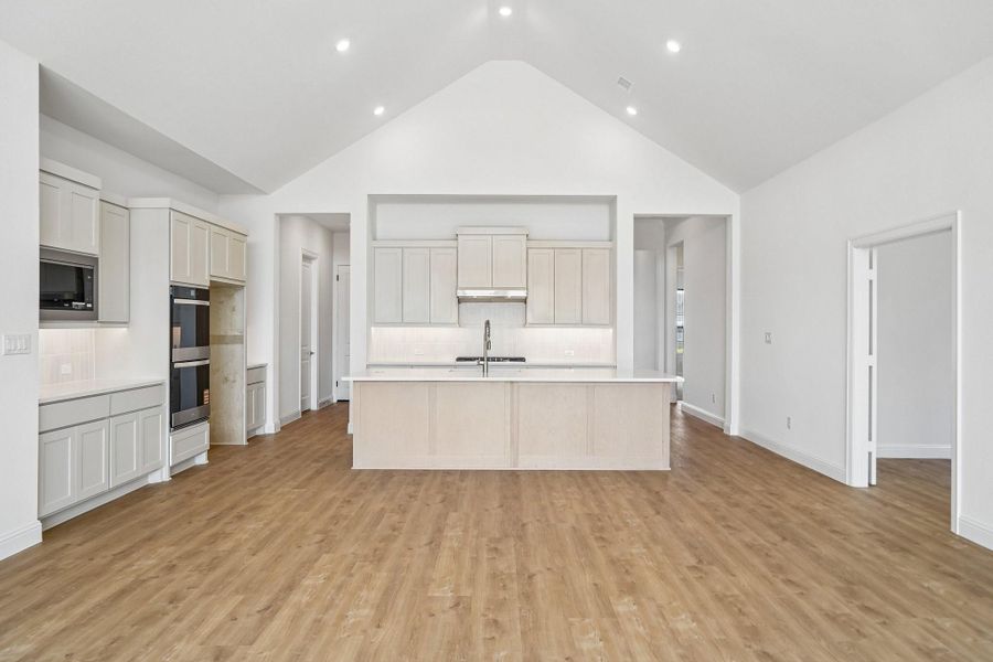 Furnished interior view inside a new home in Del Bello Lakes 60', Manvel (Image 8).