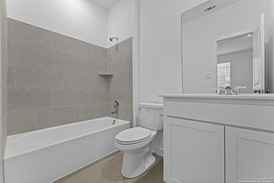 Furnished interior view inside a new home in , New Braunfels (Image 8).