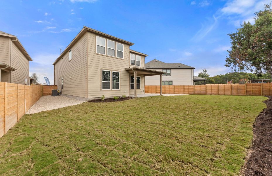 Exterior details and patio area of a home in Horizon Lake, Leander (Image 25).