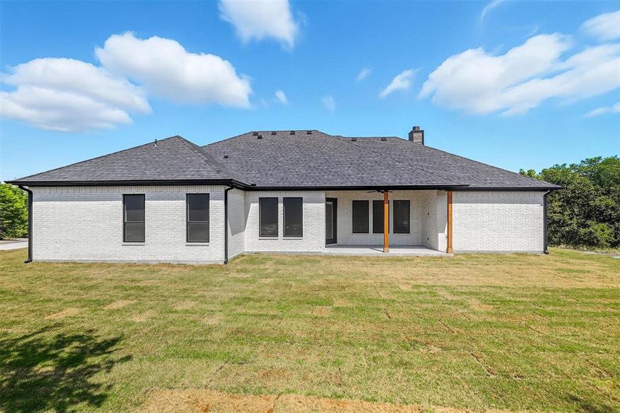 Front exterior of a new home in , Weatherford, TX, highlighting curb appeal (Image 2). Front exterior of a new home in , Weatherford, TX, highlighting curb appeal (Image 2).