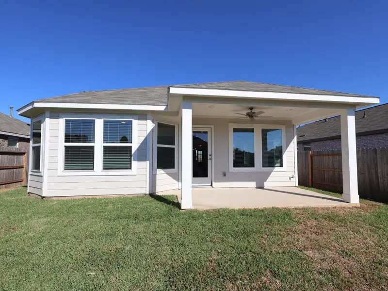 Exterior details and patio area of a home in Moran Ranch, Willis (Image 3). Exterior details and patio area of a home in Moran Ranch, Willis (Image 3).