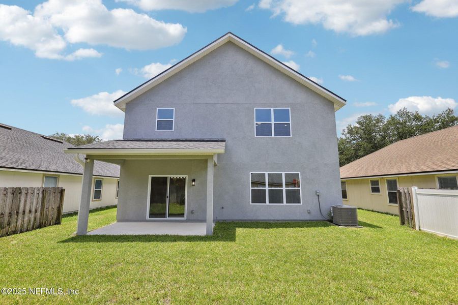 Front exterior of a new home in , Orange Park, FL, highlighting curb appeal (Image 29). Front exterior of a new home in , Orange Park, FL, highlighting curb appeal (Image 29).