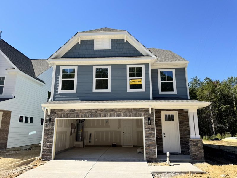 Front exterior of a new home in Caldwell Forest, Charlotte, NC, highlighting curb appeal (Image 1). Front exterior of a new home in Caldwell Forest, Charlotte, NC, highlighting curb appeal (Image 1).