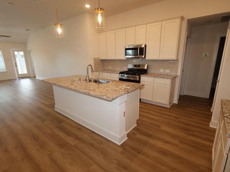 Furnished interior view inside a new home in Marvida, Cypress (Image 6).