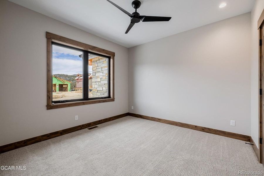 Spacious, unfurnished interior of a new home in , Granby (Image 43).