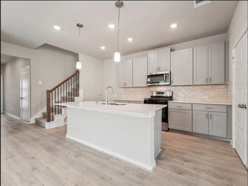 Photo is not of the actual home, but is an inspirational photo of builder’s model home and may depict options, furnishings, and/or decorator features that are not included.