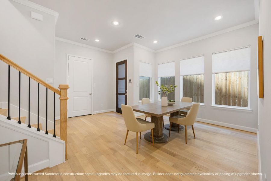 Dine under the soft embrace of daylight, with a wall of windows inviting the outside in. Dine under the soft embrace of daylight, with a wall of windows inviting the outside in.