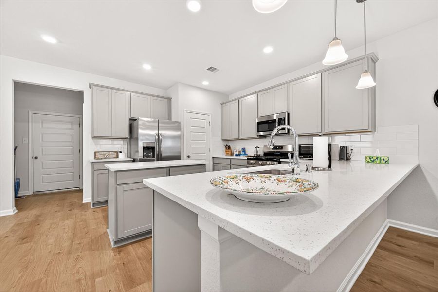 Furnished interior view inside a new home in Mill Creek Trails, Magnolia (Image 15).
