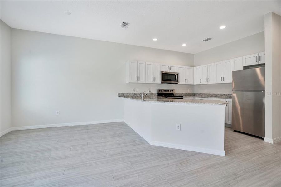 Furnished interior view inside a new home in , Kissimmee (Image 9). Furnished interior view inside a new home in , Kissimmee (Image 9).