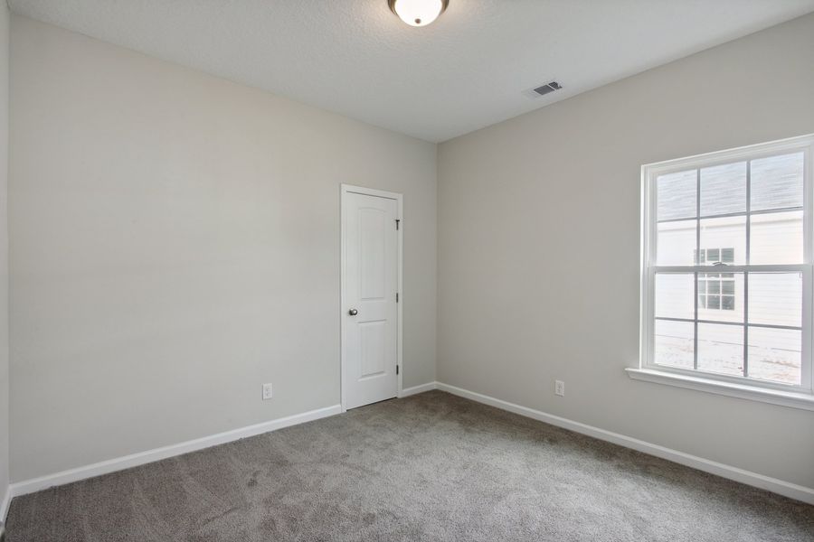 Representative unfurnished interior of a home built from the The Stafford by RTS Homes in The Pointe at Villages on Marne, Hinesville (Image 46).