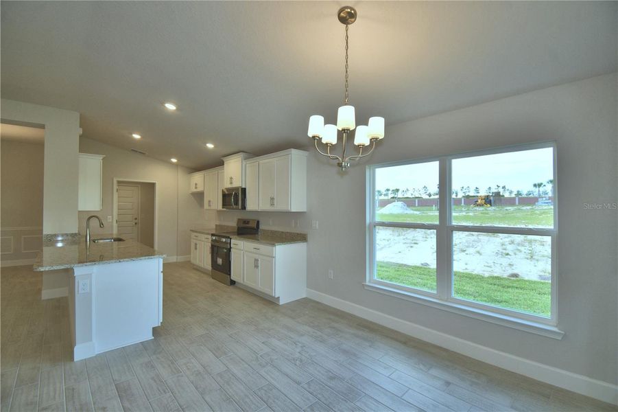 Furnished interior view inside a new home in Lake Juliana Estates, Auburndale (Image 10).