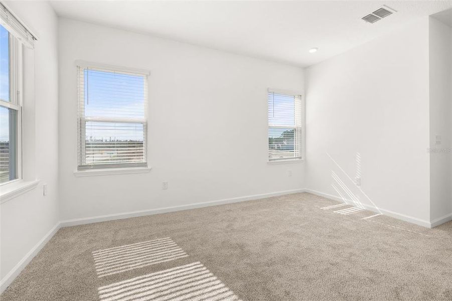 Spacious, unfurnished interior of a new home in Serenade at Ovation, Winter Garden (Image 13). Spacious, unfurnished interior of a new home in Serenade at Ovation, Winter Garden (Image 13).