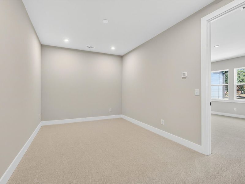 Spacious, unfurnished interior of a new home in Seven Oaks, Belmont (Image 17).
