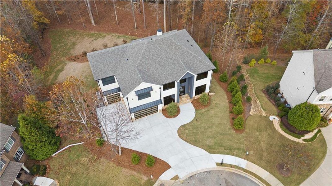 Front exterior of a new home in , Milton, GA, highlighting curb appeal (Image 29).