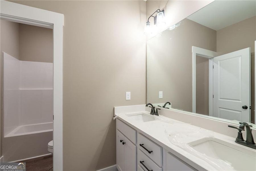 Furnished interior view inside a new home in , Social Circle (Image 7). Furnished interior view inside a new home in , Social Circle (Image 7).