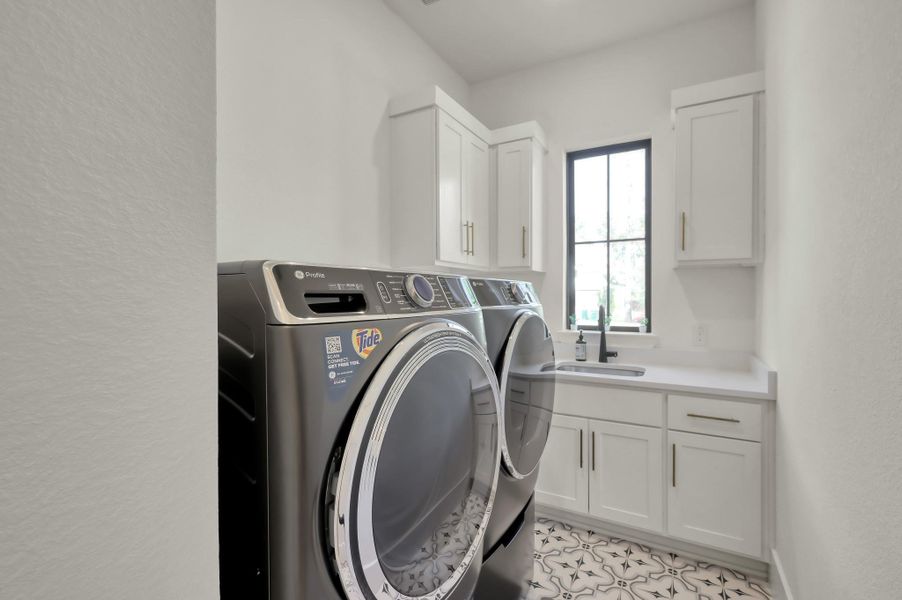 It's the details that make this house a home. A sink in the laundry room is one of those details.