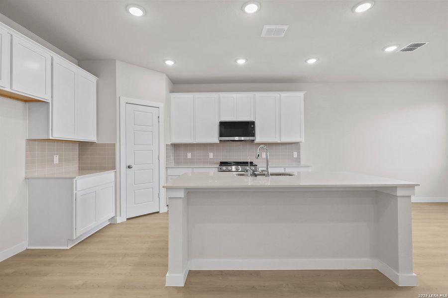 Furnished interior view inside a new home in Cinco Lakes, San Antonio (Image 11).