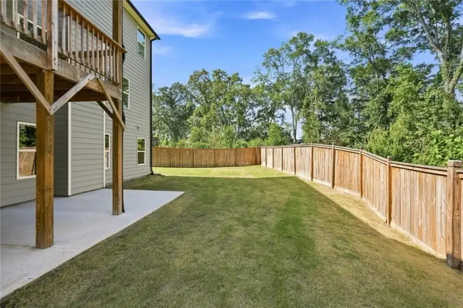 Exterior details and patio area of a home in Little River Falls, Woodstock (Image 24).