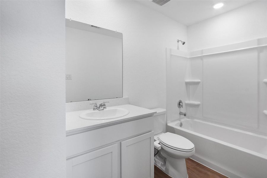 Secondary Bathroom with a Bidet.