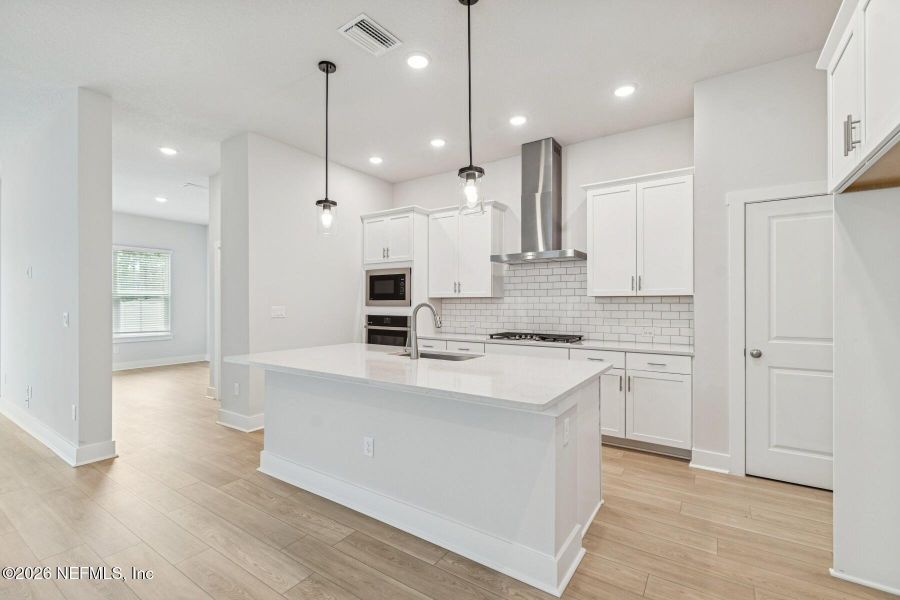 Furnished interior view inside a new home in Kettering at eTown - Paired Villas, Jacksonville (Image 9).