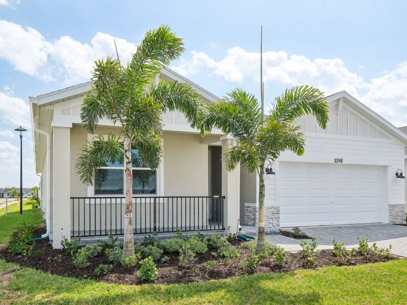 Front exterior of a new home in Brystol at Wylder - Reserve Series, Port St. Lucie, FL, highlighting curb appeal (Image 2).
