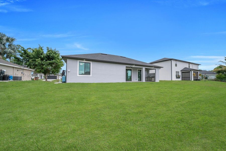 Exterior details and patio area of a home in , Lehigh Acres (Image 23).