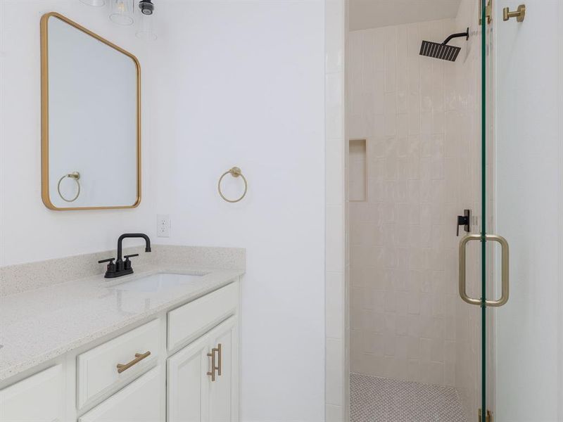 Master bath with shower stall.