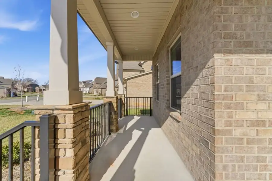 Exterior details and patio area of a home in Blacksmith, Stokesdale (Image 3).