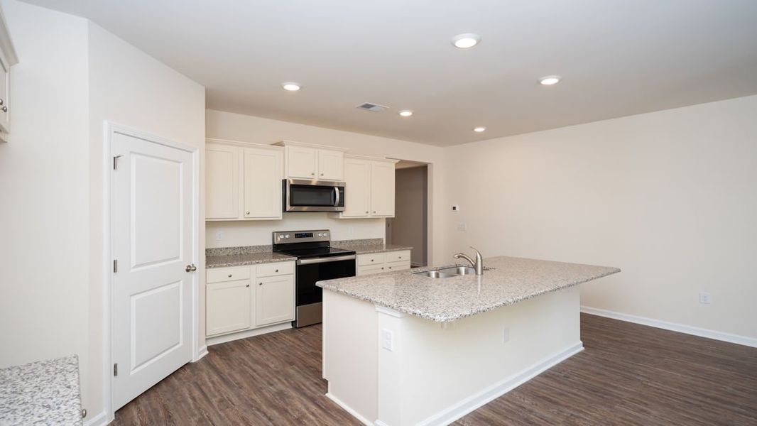 Representative furnished interior of a home built from the CALI by D.R. Horton in The Reserve at Wild Horse, Conway (Image 9).