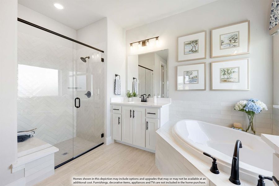 Master bathroom with glass walk-in shower, soaking tub, and white vanity with black fixtures