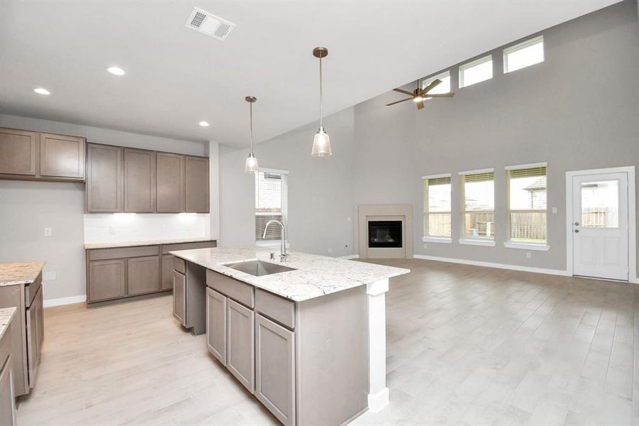 This generously spacious kitchen is a dream realized! Sample photo of completed home with similar floor plan. Actual colors and selections may vary.