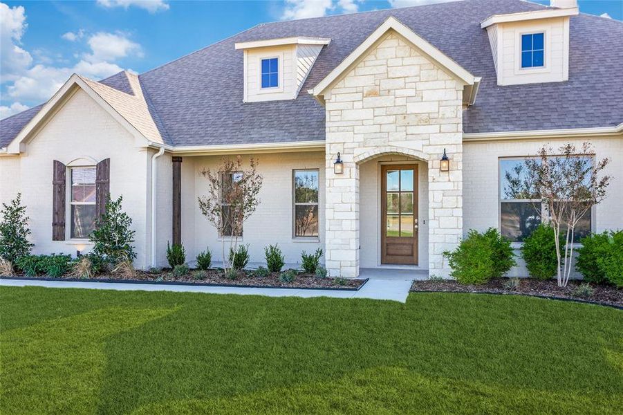 Front exterior of a new home in Parker Ridge, Weatherford, TX, highlighting curb appeal (Image 18).