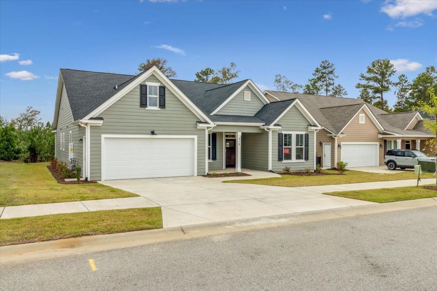 Front exterior of a new home in Sinclair at Crawford Creek, Grovetown, GA, highlighting curb appeal (Image 24).